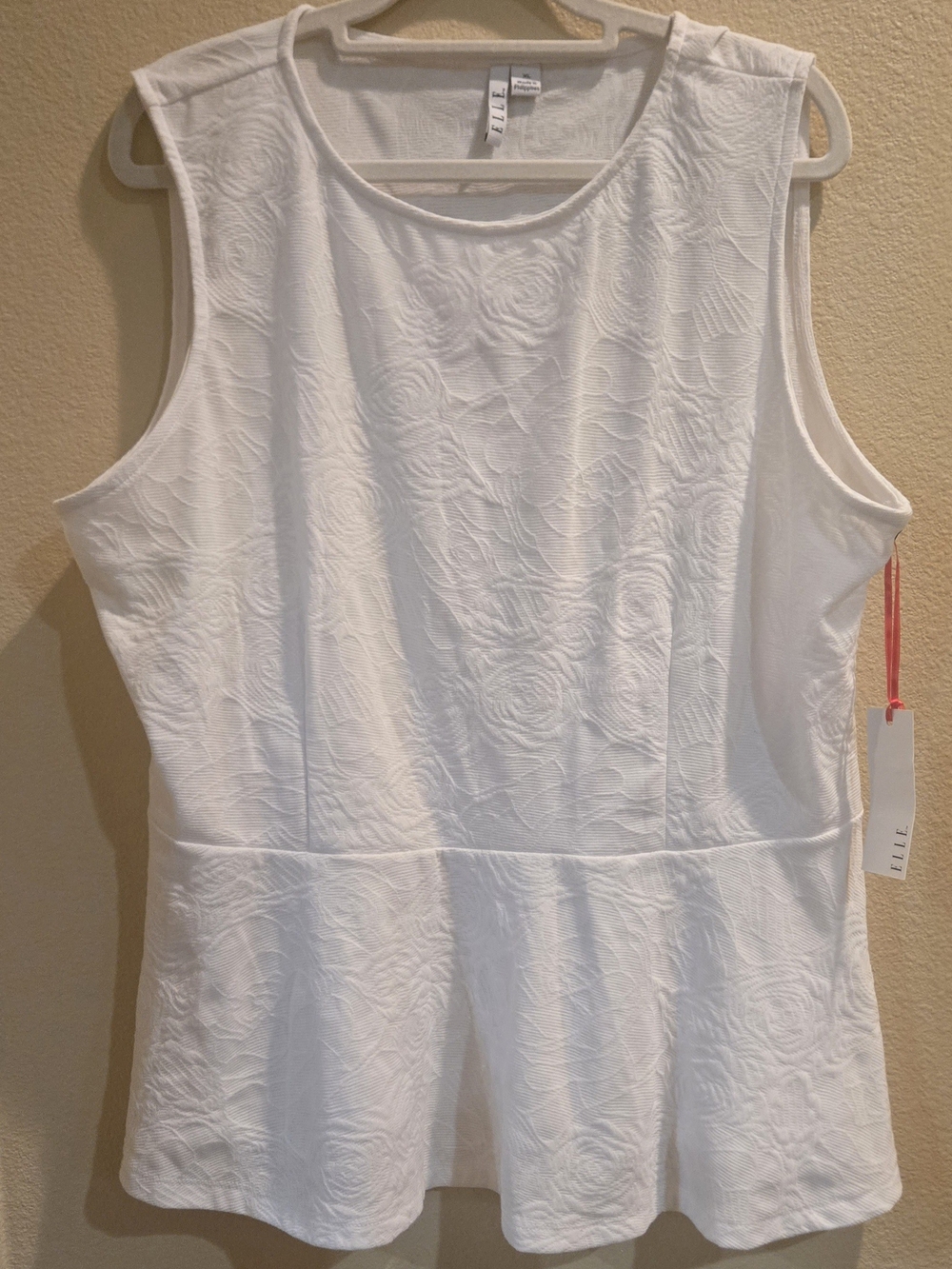 ELLE White Textured Sleeveless Peplum Top